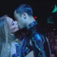Jennifer Lopez surprises by kissing her dancers on stage