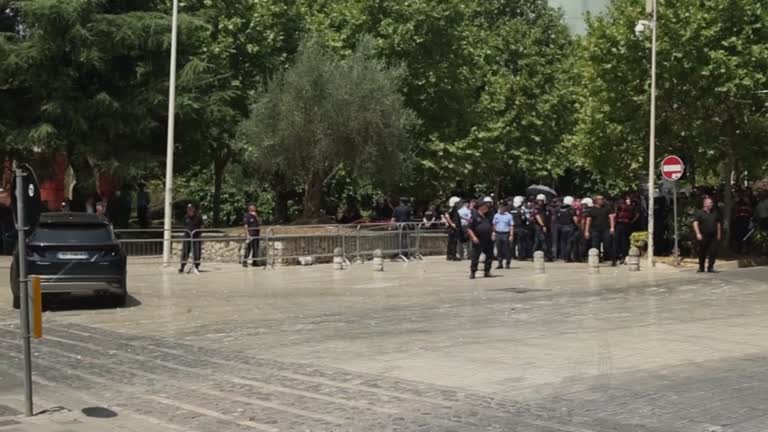 Protesters throw eggs at Albanian lawmakers' motorcades outside Parliament