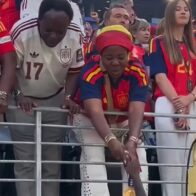Nico Williams gives his World Cup medal to his mother after Spain's victory