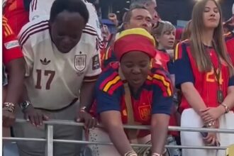 Nico Williams gives his World Cup medal to his mother after Spain's victory
