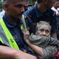 Dramatic rescue of elderly woman trapped in mud after deadly Nepal floods