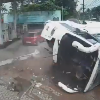 Tourist bus overturns in India after swerving to avoid scooter
