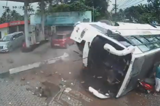 Tourist bus overturns in India after swerving to avoid scooter