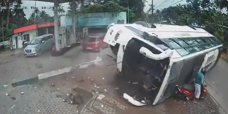 Tourist bus overturns in India after swerving to avoid scooter