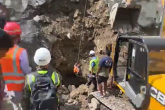 Rescuers search flooded tunnels for possible survivors after Nepal landslide