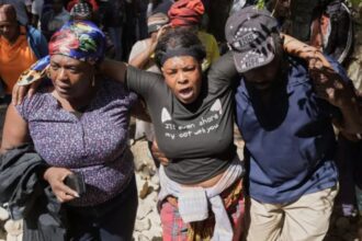 At least 40 killed as gangs attack displaced people near Haiti's capital