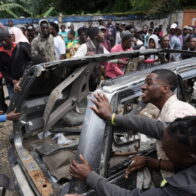 Gang displays high-caliber weapons after deadly attack in Haiti and threatens to kill hostages