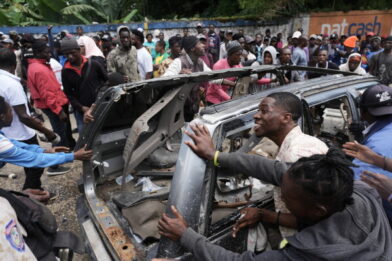 Gang displays high-caliber weapons after deadly attack in Haiti and threatens to kill hostages