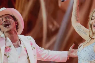 Karol G and Bruno Mars perform “Still” live together for the first time