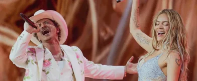 Karol G and Bruno Mars perform “Still” live together for the first time