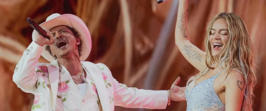 Karol G and Bruno Mars perform “Still” live together for the first time