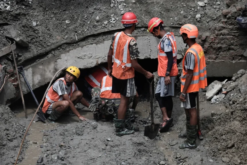 Two workers rescued alive from depths of Nepal hydropower plant after more than a week
