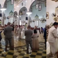 Couple gets married inside flooded church in the Philippines
