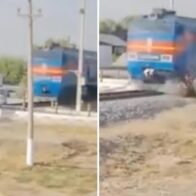 Passenger train crashes into car at railway crossing, killing four