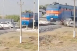 Passenger train crashes into car at railway crossing, killing four