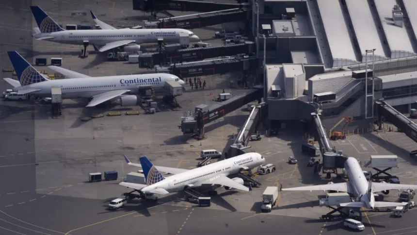 Thirteen injured after employee shuttle bus crashes into concrete barrier at Newark Airport