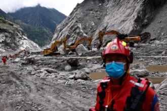 Nepal and China report nearly 1,400 deaths after devastating floods