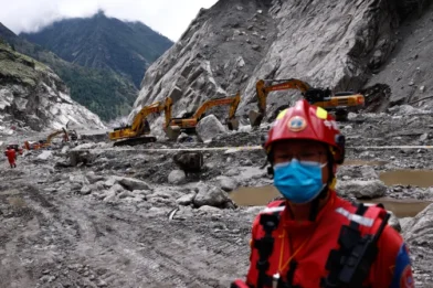 Nepal and China report nearly 1,400 deaths after devastating floods