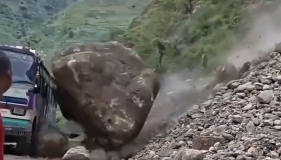 Massive rock crashes into bus after passengers escape in Nepal