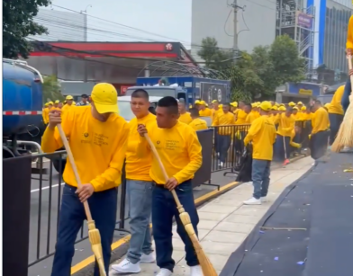 El Salvador deploys 300 inmates to clean streets after Independence Day parade