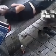 Sleeping man narrowly escapes being crushed by falling billboard