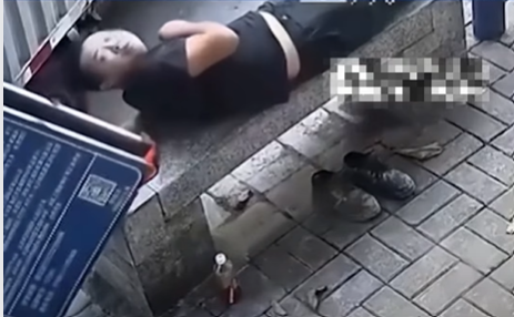 Sleeping man narrowly escapes being crushed by falling billboard