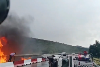 Crane crashes into barrier and catches fire in Mexico, leaving five injured