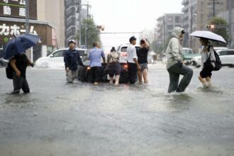 Torrential rain floods central Japan, triggers highest-level river warning