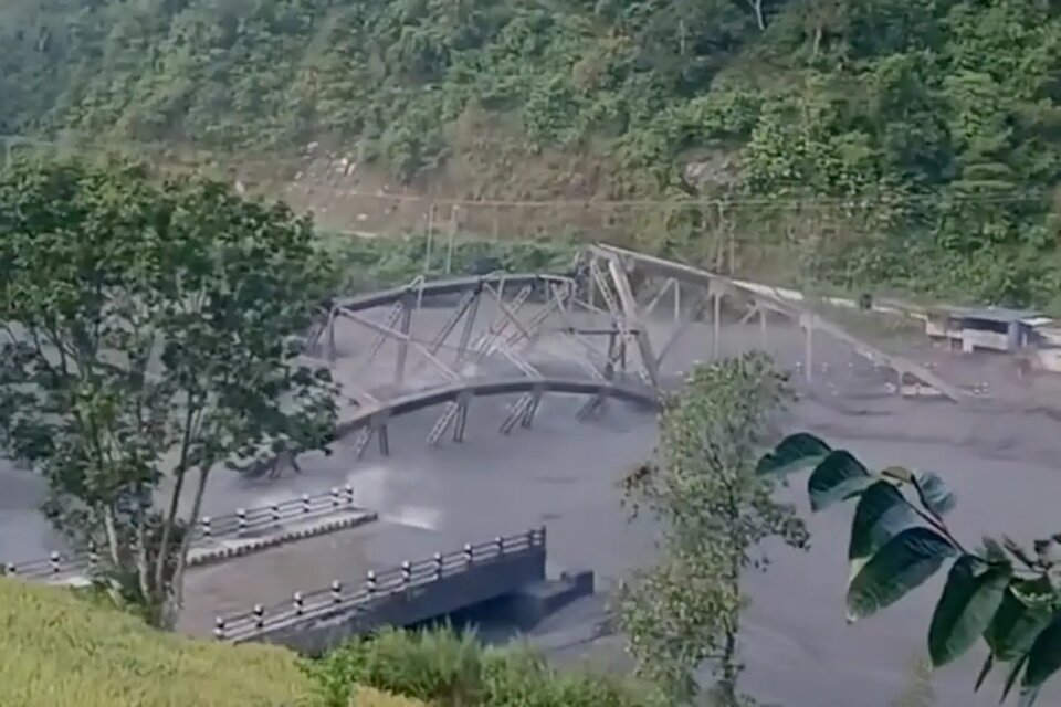 Flash floods destroy bridge in Nepal as at least five people remain missing