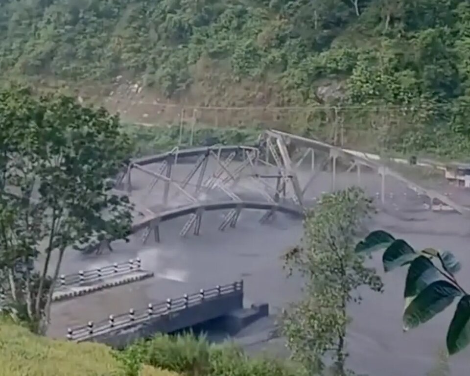 Flash floods destroy bridge in Nepal as at least five people remain missing