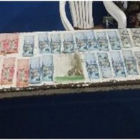 Policía apresa a dos hombres con marihuana, RD$61 mil y 960 dólares en Santiago