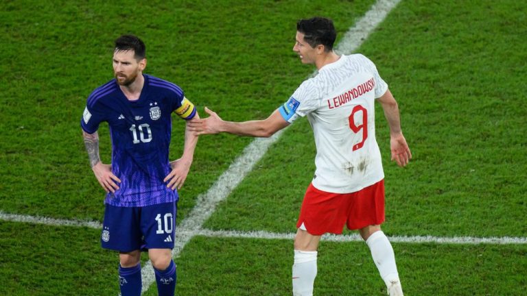 Robert Lewandowski y Lionel Messi