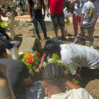 Con música y alcohol sepultan restos de mujer asesinada a tiros por expareja en Santiago