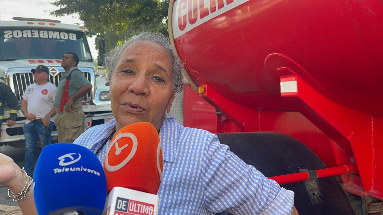 “No fue bonita la experiencia”: afirma vecina cuenta cómo vivió el incendio que consumió el almacén de Prodacom en Santiago
