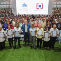  Abinader inicia entrega de títulos de propiedad de la parcela 1-B del sector Los Guandules