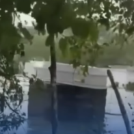 Lluvias interrumpen sepelio y dejan ataúd expuesto en Puerto Plata