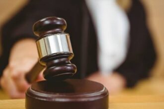 Aplazan audiencia de medida de coerción contra inspector migratorio acusado de exigir soborno de RD$100 mil