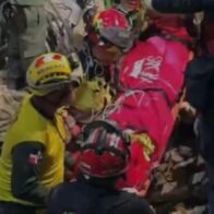Rescatistas dominicanos participan en operativo que logró salvar a niño atrapado tras terremoto en Venezuela