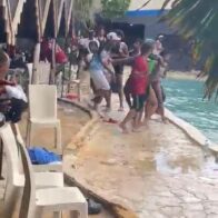 Enfrentamiento a botellazos protagonizan varias personas en piscina de Santiago; al menos siete heridos, incluyendo menores