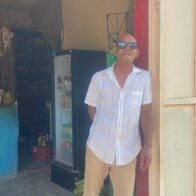 Encapuchados asaltan a mano armada a comerciante en Santiago