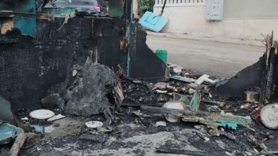 Velón encendido a San Miguel habría provocado incendio que destruyó 22 casetas en Boca Chica
