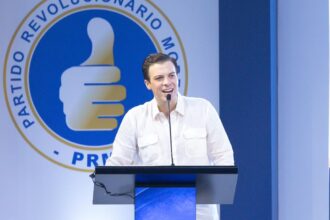 Juan Garrigó Mejía durante su discurso de juramentación como secretario general del PRM.