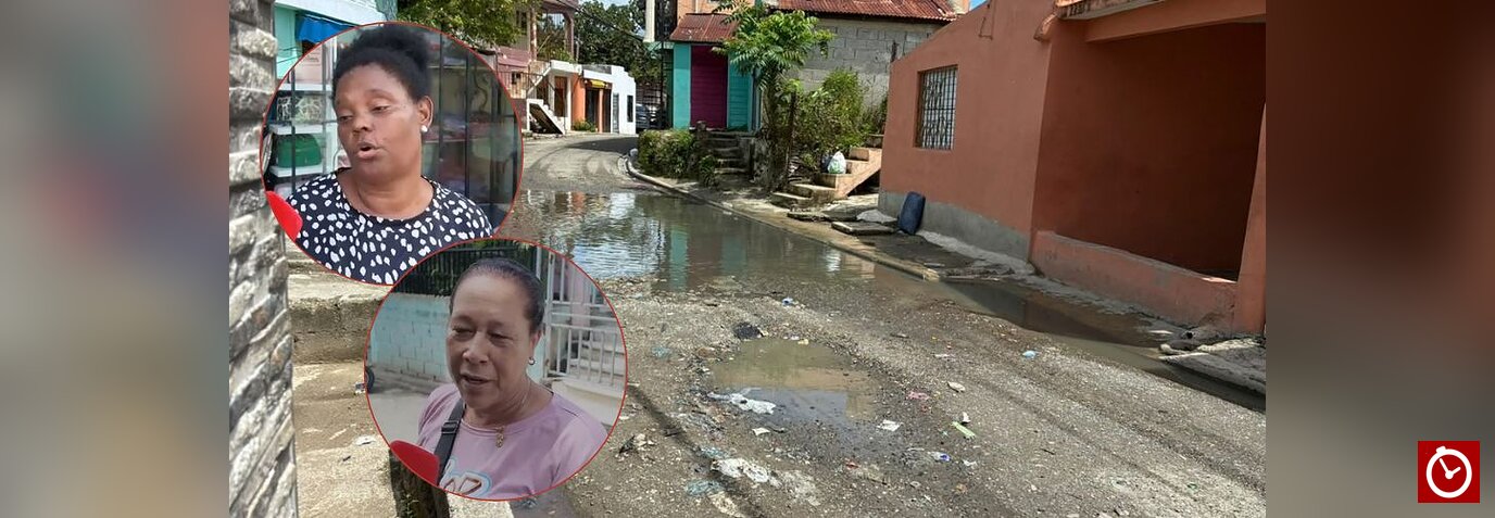 Residentes de Los Guaricanos piden a Betty Gerónimo intervenir calle Sánchez por acumulación de agua
